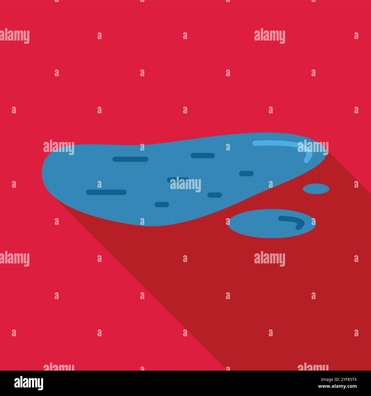 Water accumulating in a puddle on a red surface, reflecting light and ...