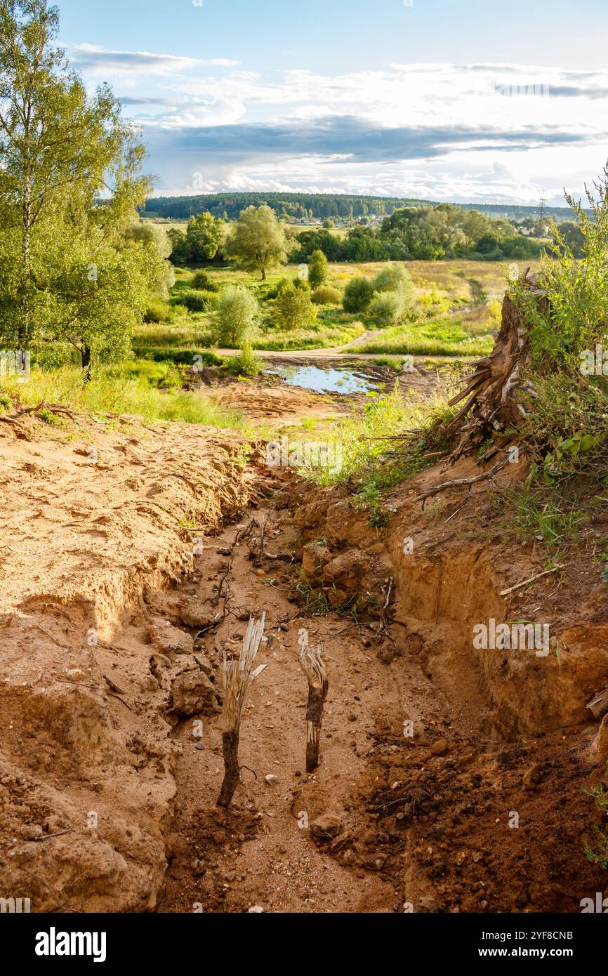 Vertical view of rain erosion of sand slope Stock Photo - Alamy