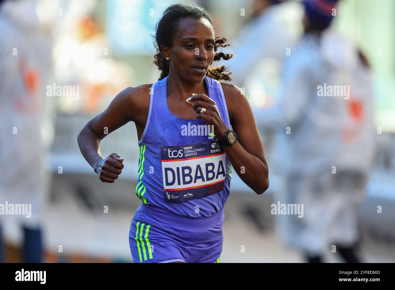 Marathoner Tirunesh Dibaba of the Ethiopia races up First Avenue during ...