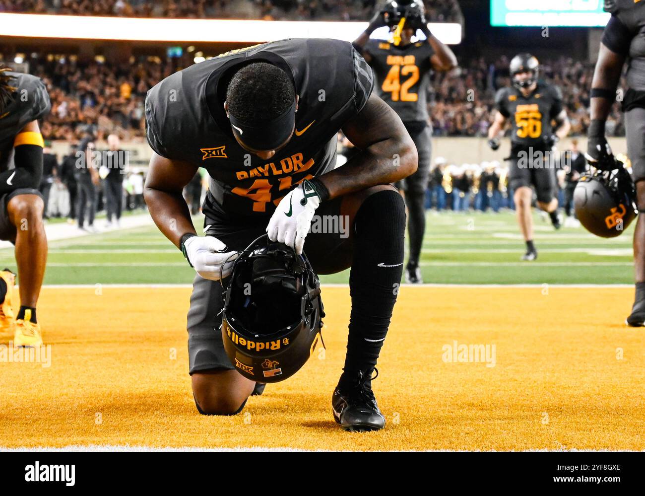 Waco, Texas, USA. 2nd Nov, 2024. Baylor Bears linebacker Kyland Reed (45) prays before the NCAA Football game between the TCU Horned Frogs and Baylor Bears at McLane Stadium in Waco, Texas. Matthew Lynch/CSM/Alamy Live News Stock Photo