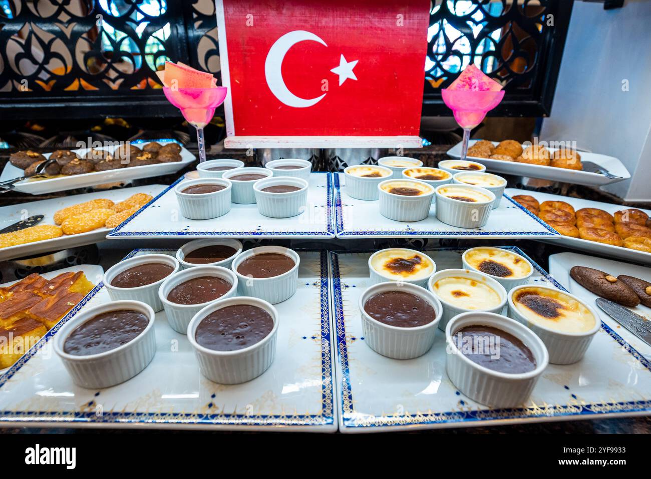 variety of sweets on display in a luxury Turkish hotel, showcasing the rich and delicious flavors of traditional Turkish desserts Stock Photo