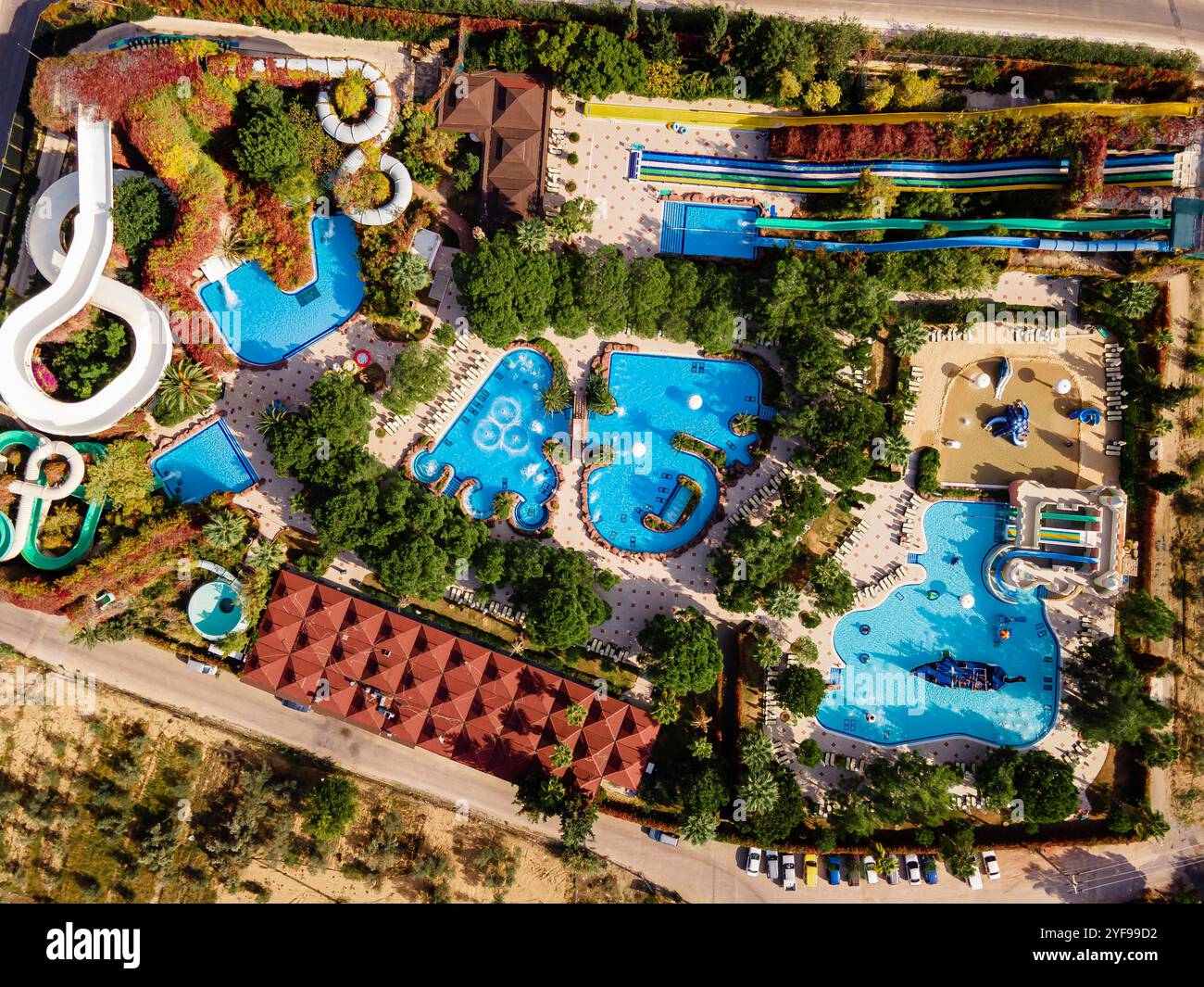 aerial view of an aqua park with large pools and slides in a luxurious beach resort hotel, perfect for a fun and relaxing vacation. Stock Photo
