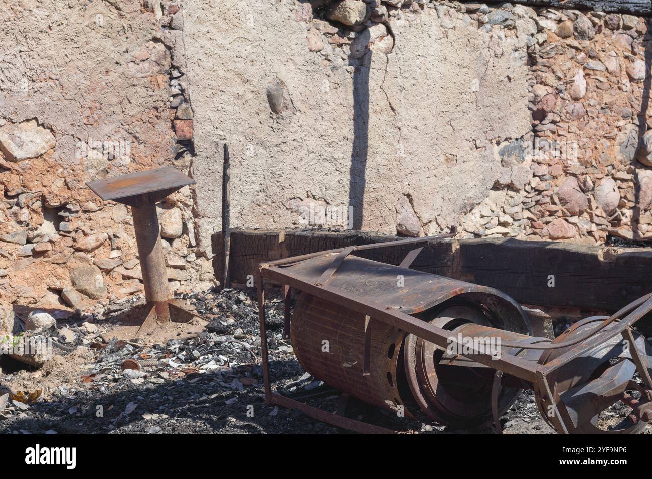 old metal things in a burnt boulder house Stock Photo