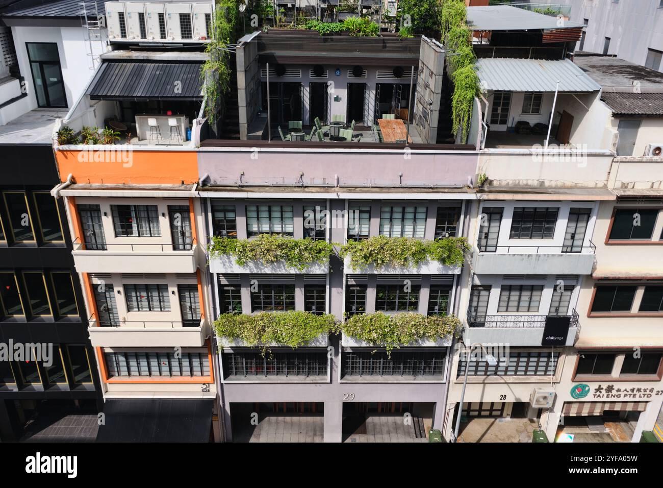 Singapore - August 12, 2024: Row of traditional Singapore shophouses at near the Chinatown, Hong Kong Street Stock Photo