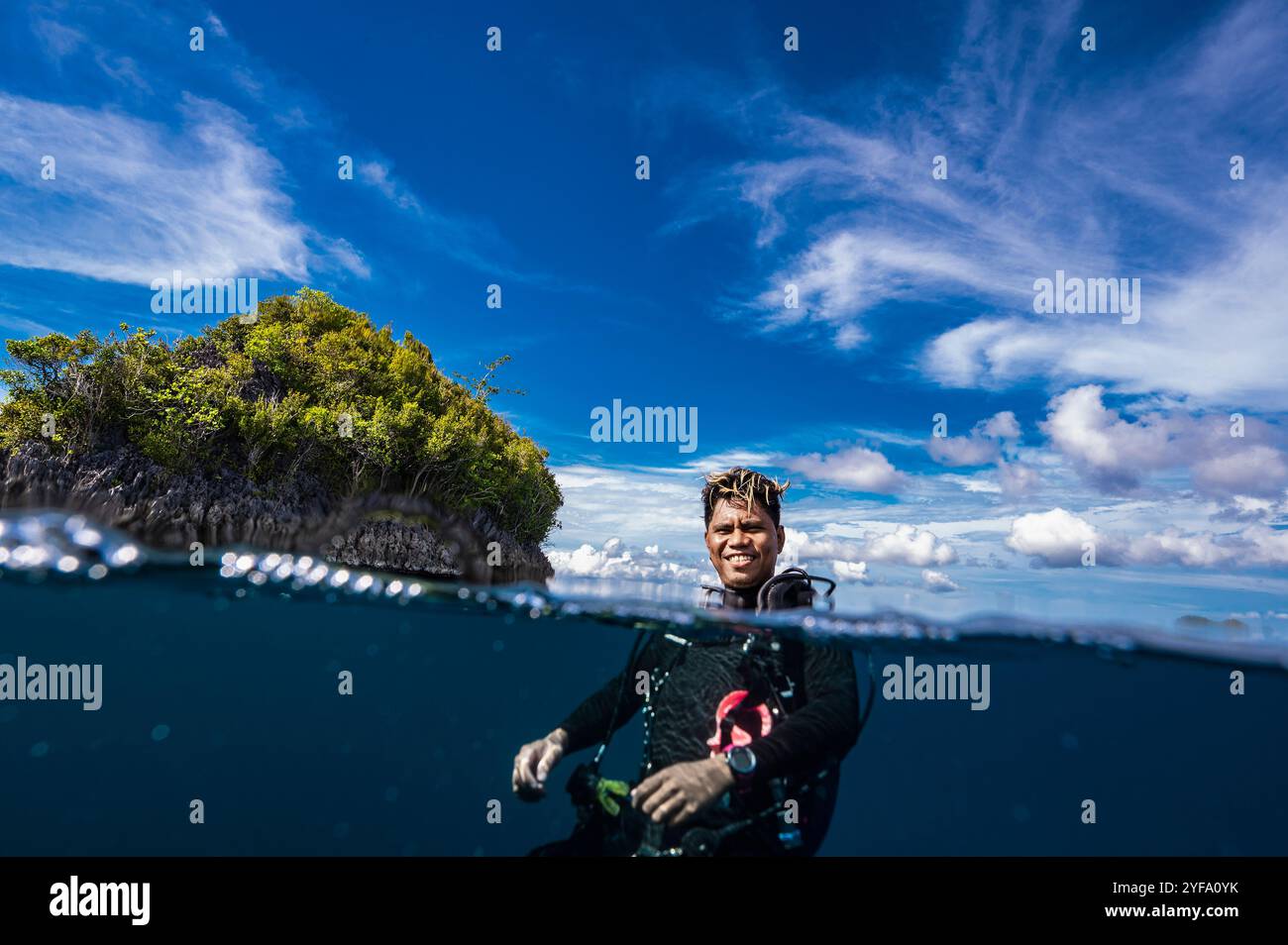 Scuba diver floating surface water hi-res stock photography and images ...