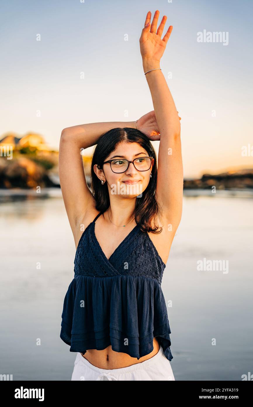 Woman in blue top hi-res stock photography and images - Alamy