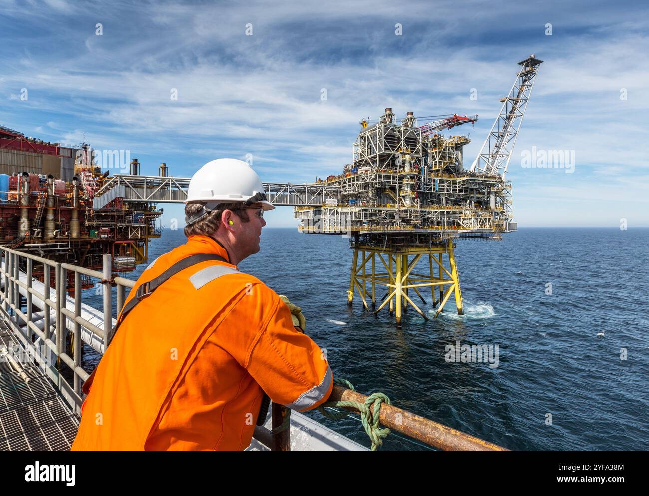 Oil worker on an offshore oil rig in the north sea Stock Photo