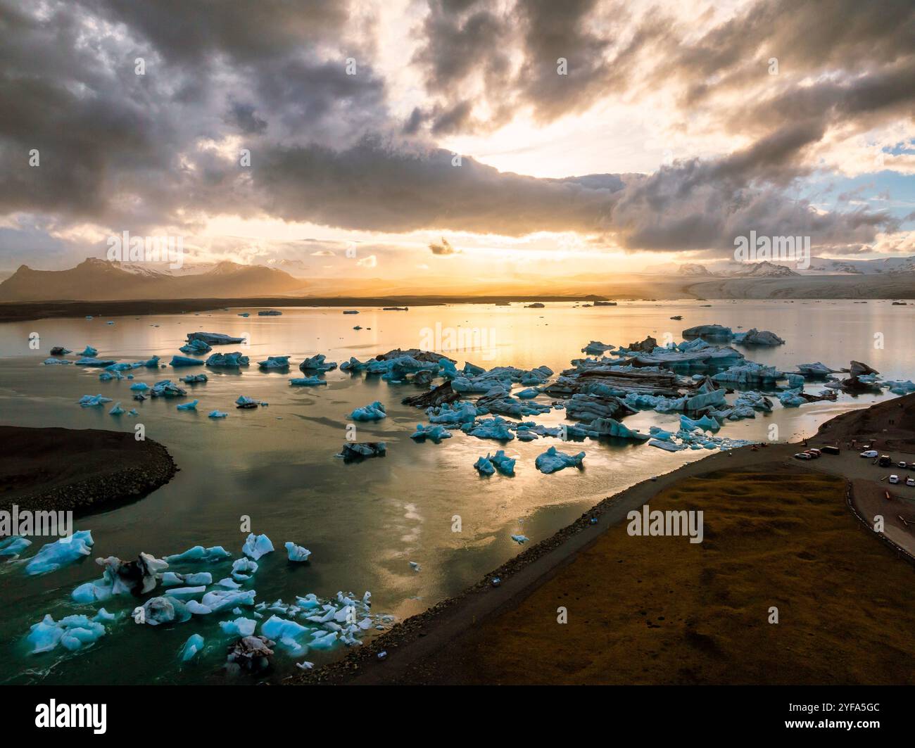 Breathtaking aerial view of Jokulsarlon Glacier Lagoon at sunset ...