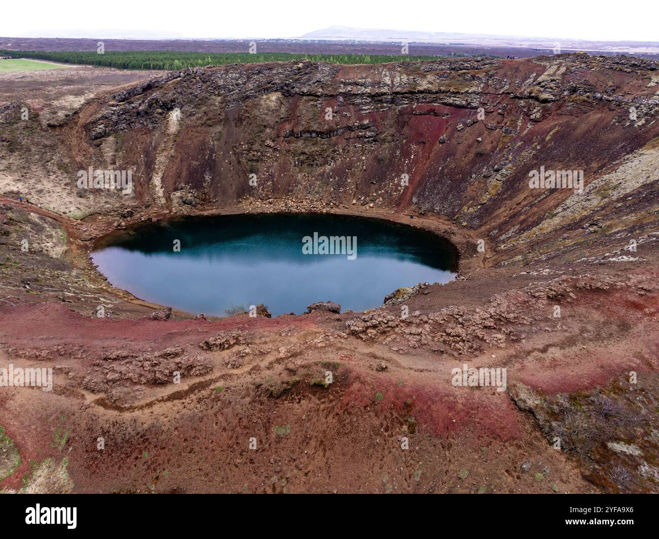 Aerial view of Kerið volcanic crater lake, a striking natural landmark ...