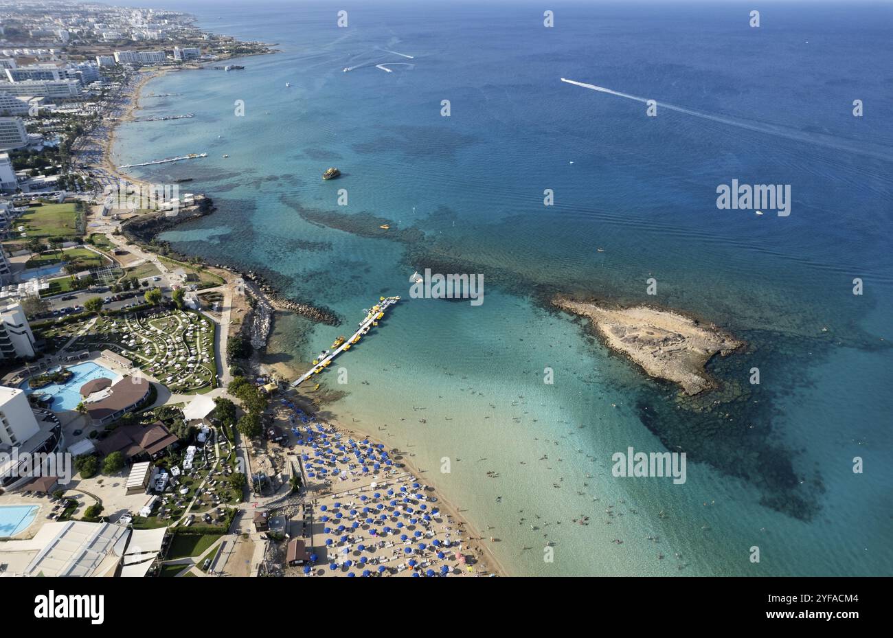 Aerial drone photograph of fig tree bay beach. with tourists relaxing and enjoying summer vacations cyprus Stock Photo