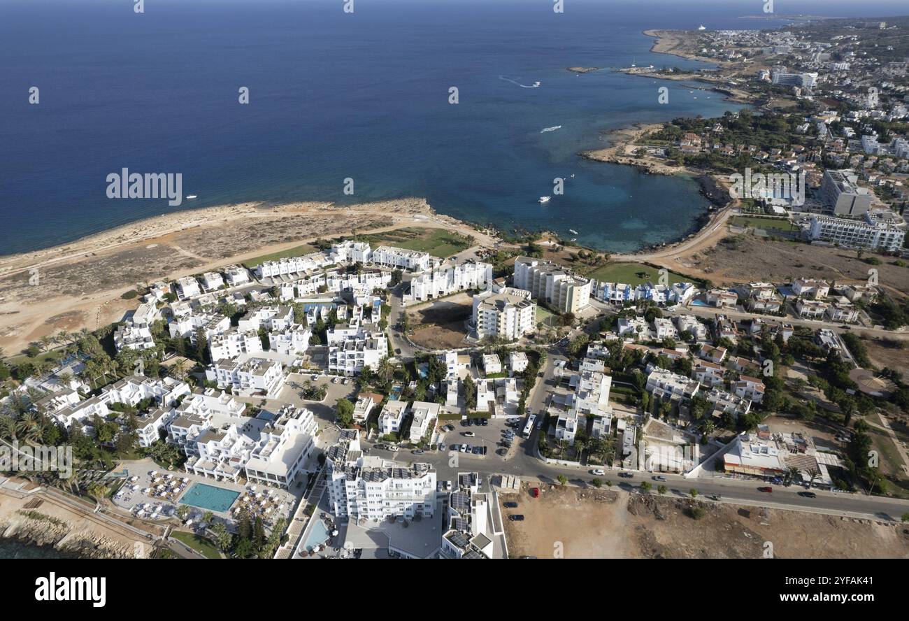 Aerial drone photograph of fig tree bay beach. with tourists relaxing and enjoying summer vacations cyprus Stock Photo