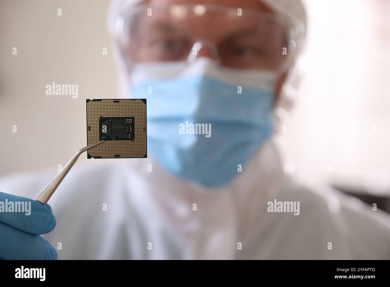 Computer Chip Masks Selective focus on microprocessor hi-res stock photography and images ...