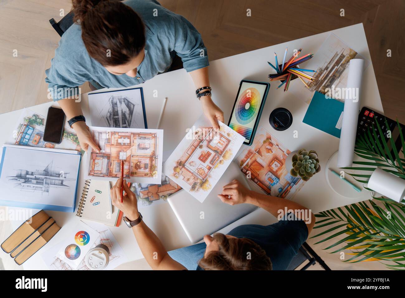 Designers working in studio and sketching. Stock Photo