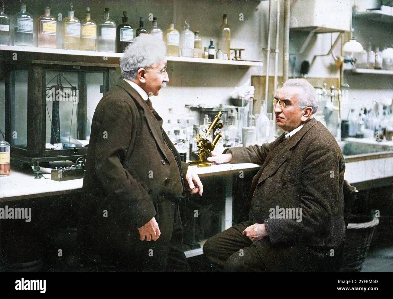 The Lumière brothers - Auguste (1862-1954) and Louis (1864-1948) Lumière in their laboratory - Stock Photo