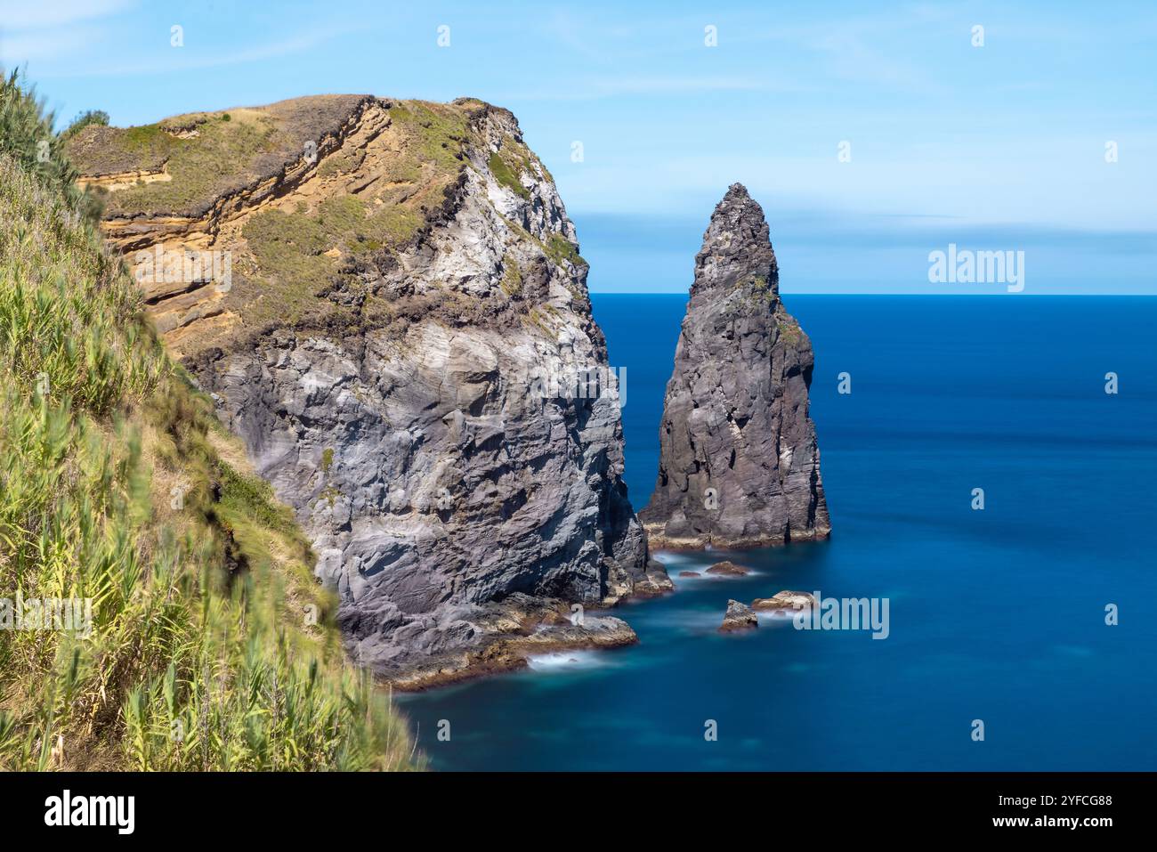 On the North Coast of Sao Miguel Island, Azores, the Miradouro da Ribeirinha boasts a breathtaking panoramic view of the rugged coastline. Stock Photo