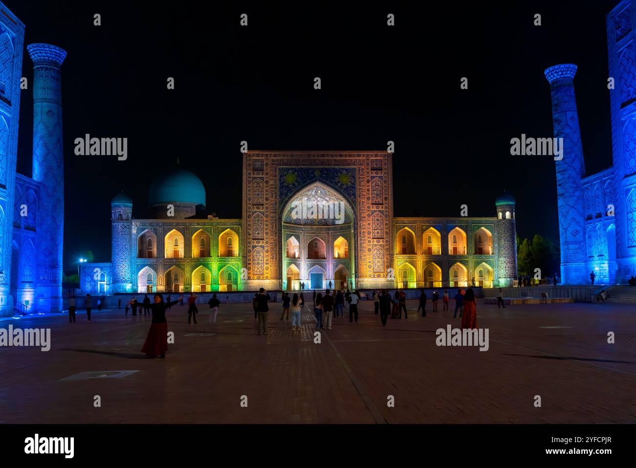 Night view of  the Tilya Kori Madrasah located by Registan square. It is part of Ensemble of Registan in historic center at the heart of Samarkand, Uz Stock Photo