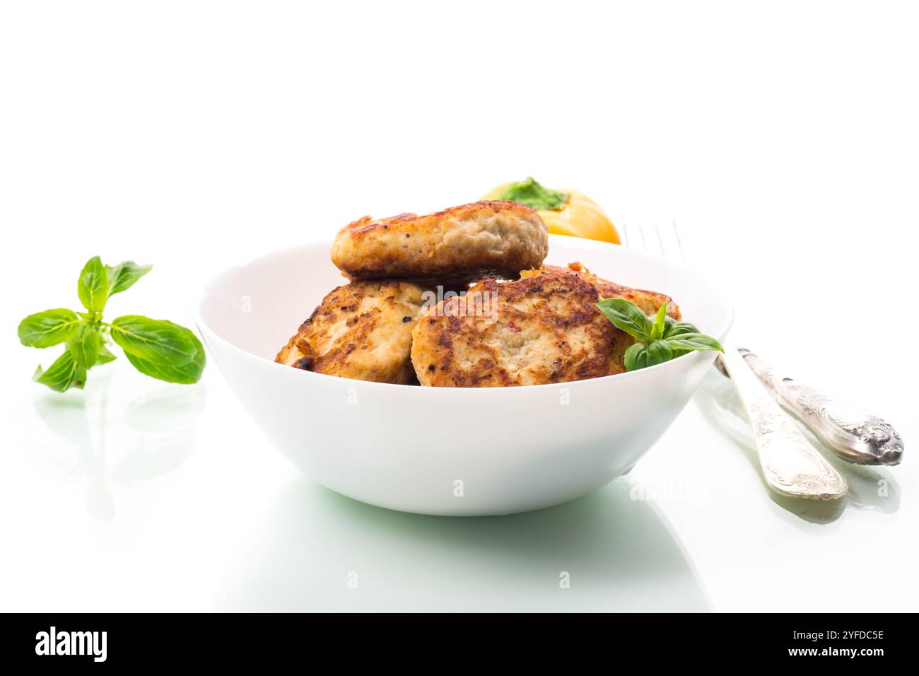 fried chicken cutlets in a bowl, isolated on white background Stock ...