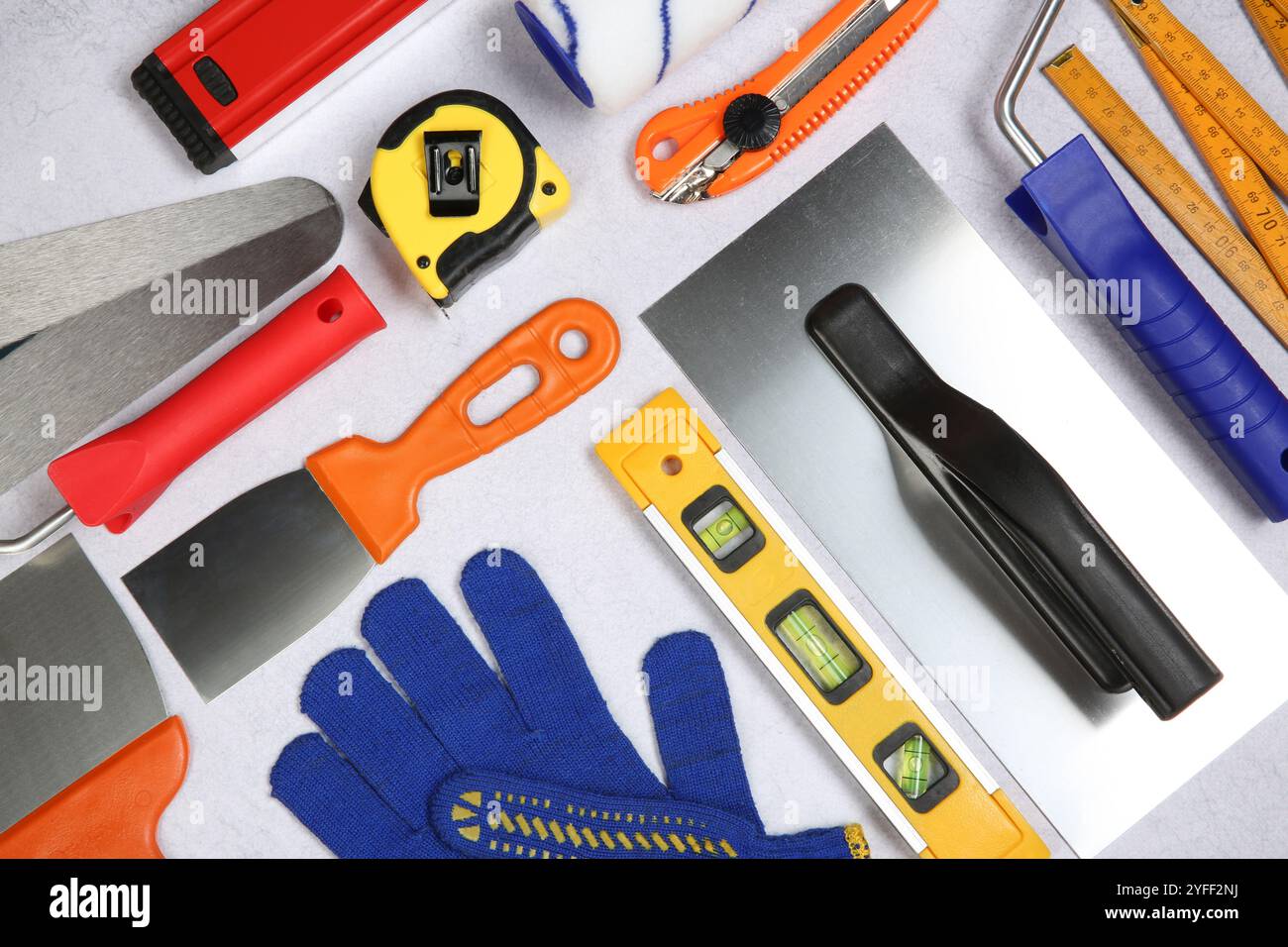 Flat lay composition with different construction tools on grey textured table Stock Photo