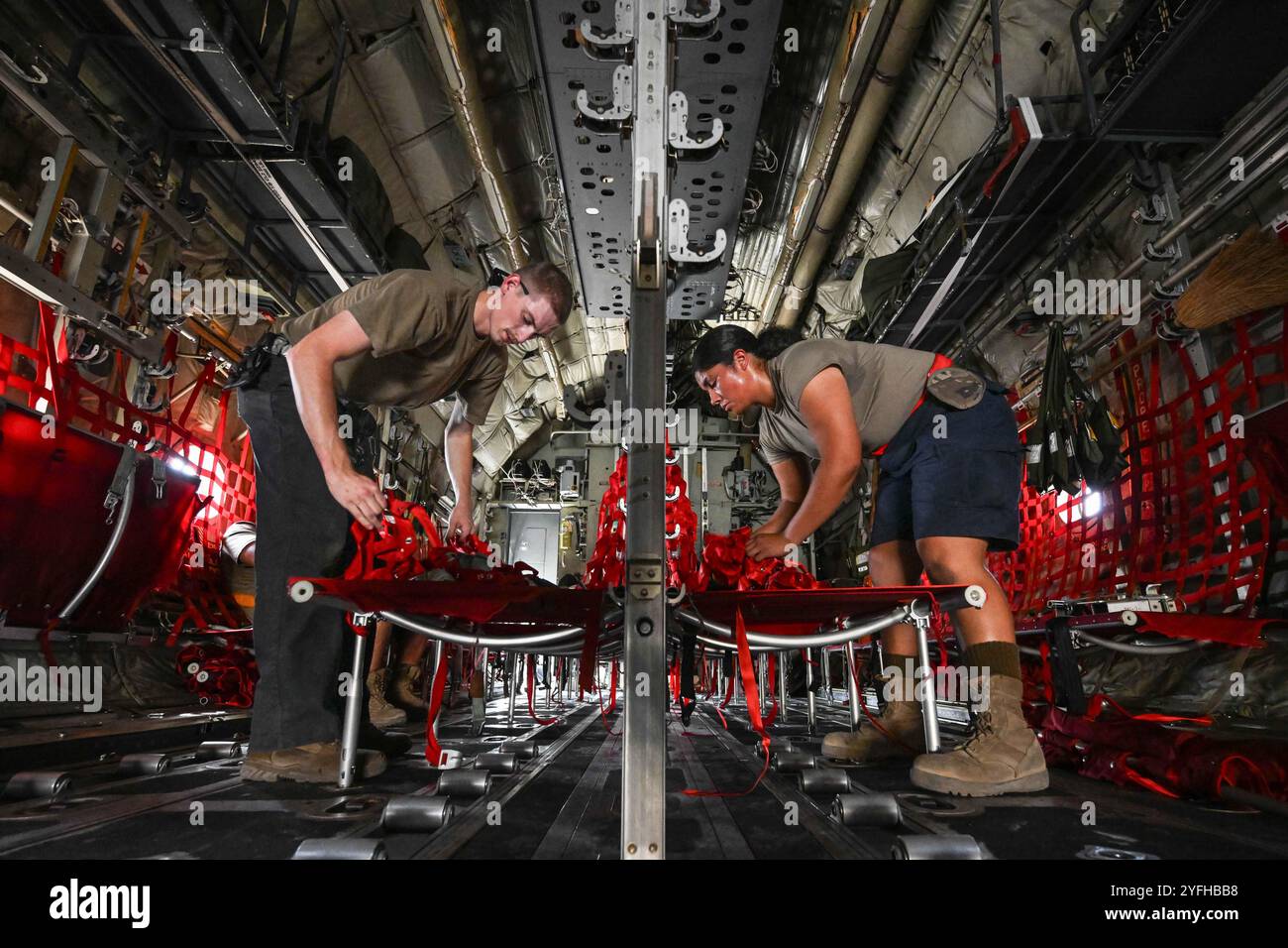 USCENTCOM, Undisclosed Location. 10th Oct, 2024. Two 39th Expeditionary Aircraft Maintenance Unit C-130J Super Hercules crew chiefs set up seats on a U.S. Air Force C-130J within the U.S. Central Command area of responsibility (AOR), Oct. 10, 2024. The Airmen were conducting an inspection, ensuring the aircraft was ready to support the U.S. CENTCOM AOR's primary airlift hub and gateway for delivering combat power. (Credit Image: © U.S. Air Force/ZUMA Press Wire) EDITORIAL USAGE ONLY! Not for Commercial USAGE! Stock Photo