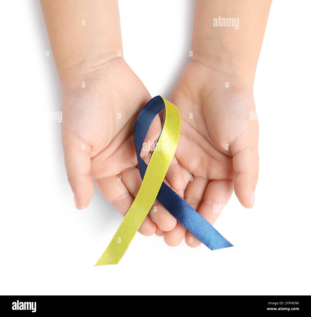 Child with yellow and blue ribbon on white background, top view. Down ...