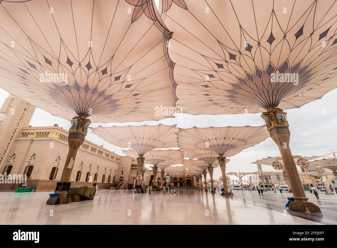 Shading umbrellas of the Prophet's Mosque in Al Haram area of Medina ...