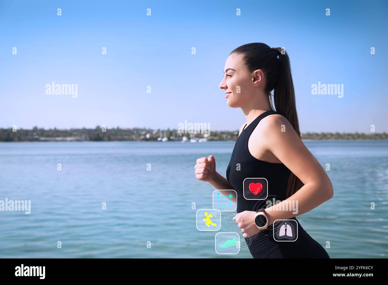 Woman with smart watch running near river outdoors. Icons near device Stock Photo