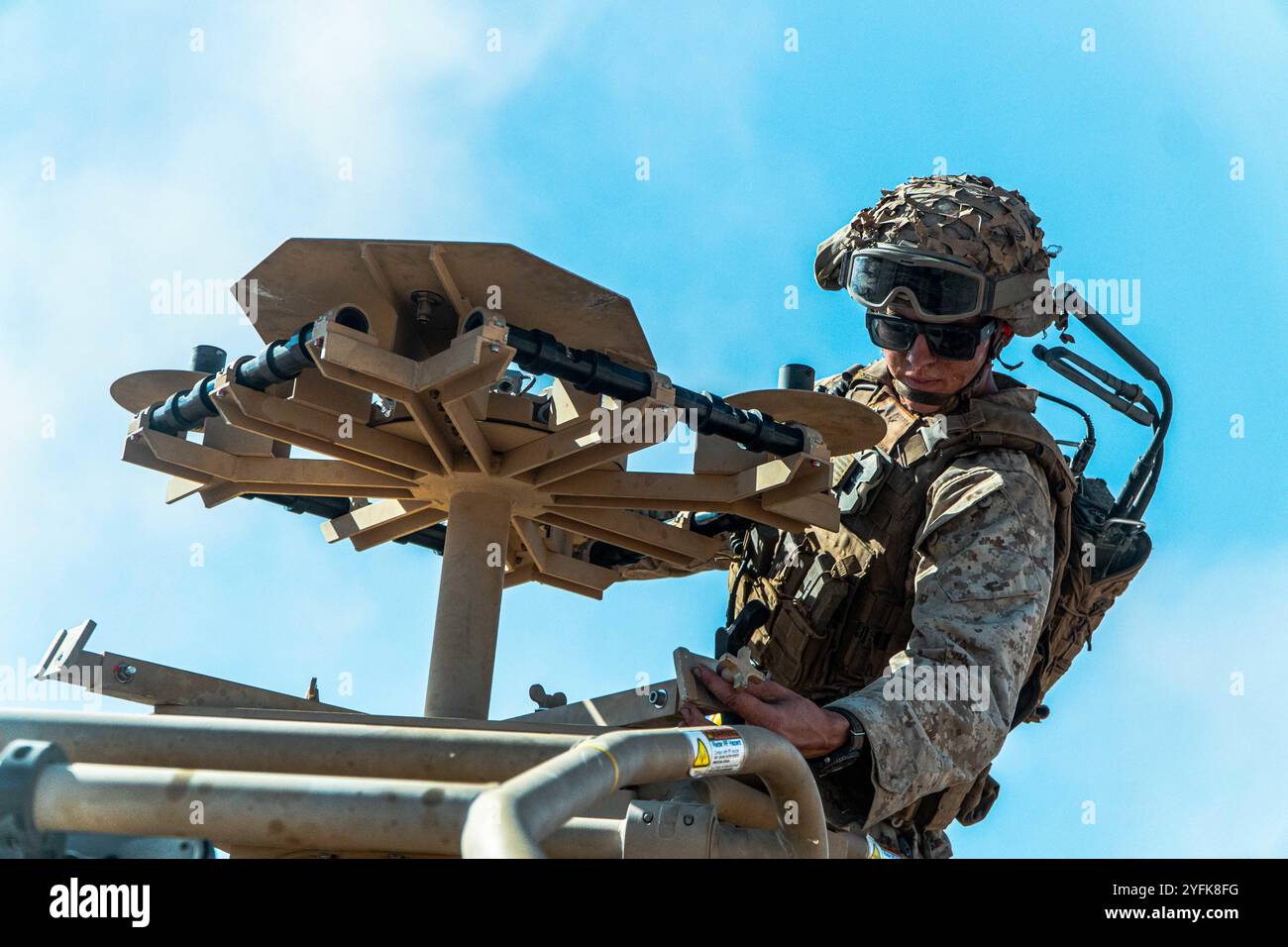 Wellton, Arizona, USA. 10th Oct, 2024. U.S. Marine Corps Lance Cpl. Brayden Westcott a Midland, Texas native and a low altitude air defense gunner assigned 3rd Low Altitude Air Defense Battalion, 3rd Marine Aircraft Wing, sets up a radar pedestal on a Light Marine Air-Defense Integrated System during a ground-based air defense exercise as part of Weapons and Tactics Instructor course 1-25 at Tacts Airfield, near Wellton, Arizona, Oct. 10, 2024. WTI is a seven-week training event hosted by Marine Aviation Weapons and Tactics Squadron One which emphasizes operational integration of the six f Stock Photo