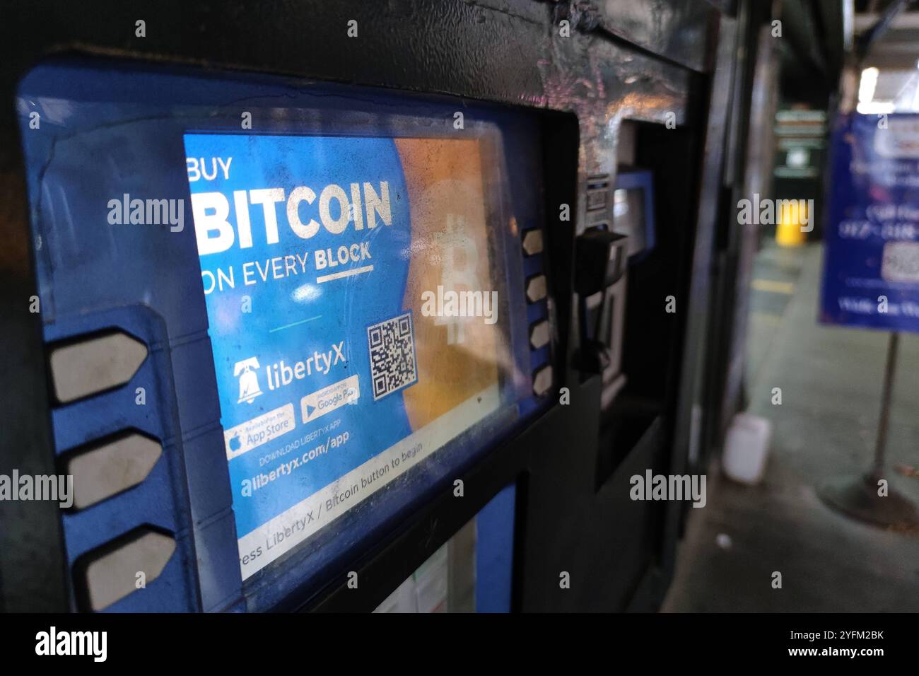 New York, USA. A Bitcoin ATM is advertised in the window of a New York city  deli. Photo by Enrique Shore Stock Photo - Alamy