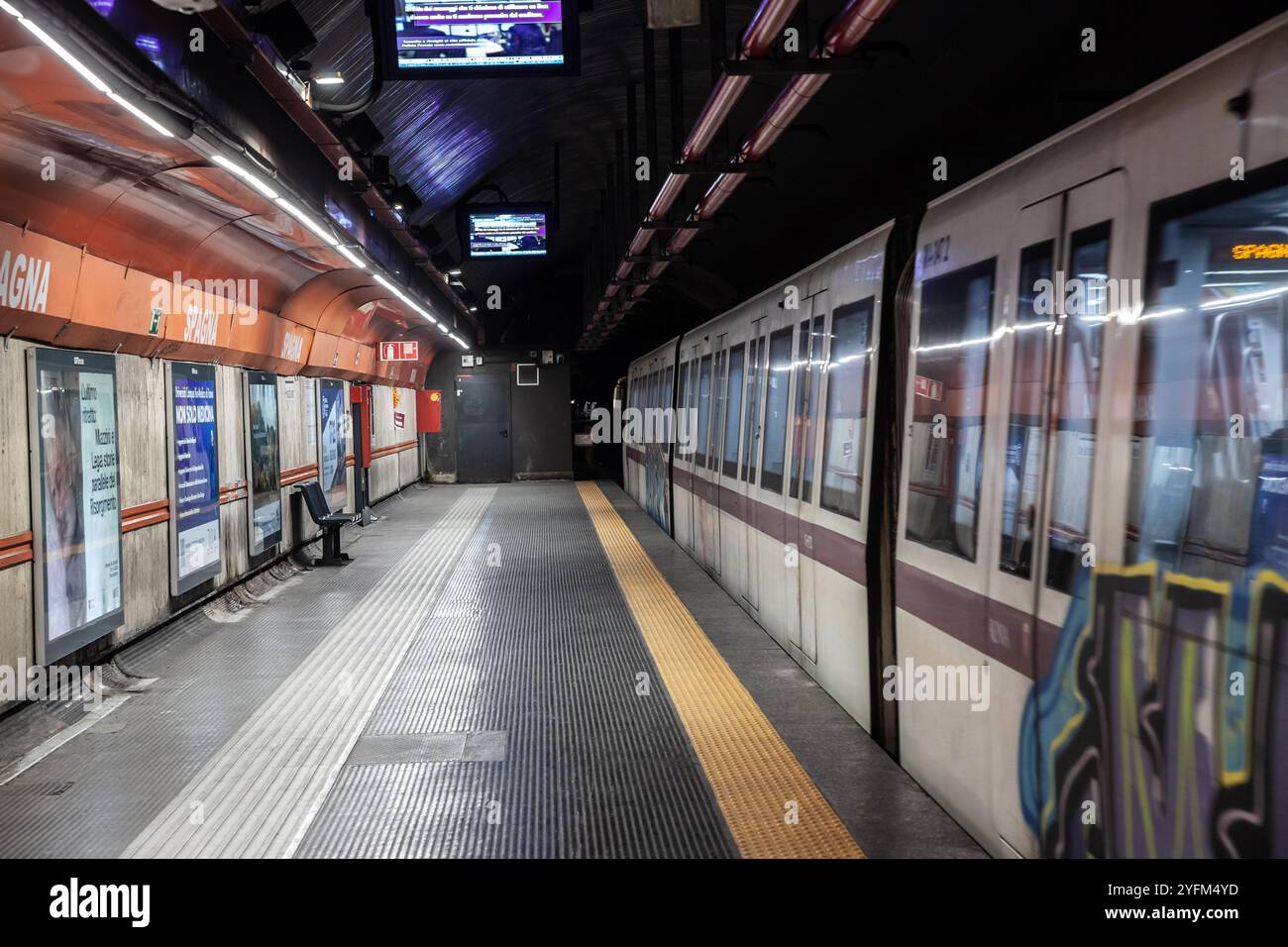 ROME, ITALY - JUNE 15, 2024: Rome Metro train arriving at Spagna metro ...