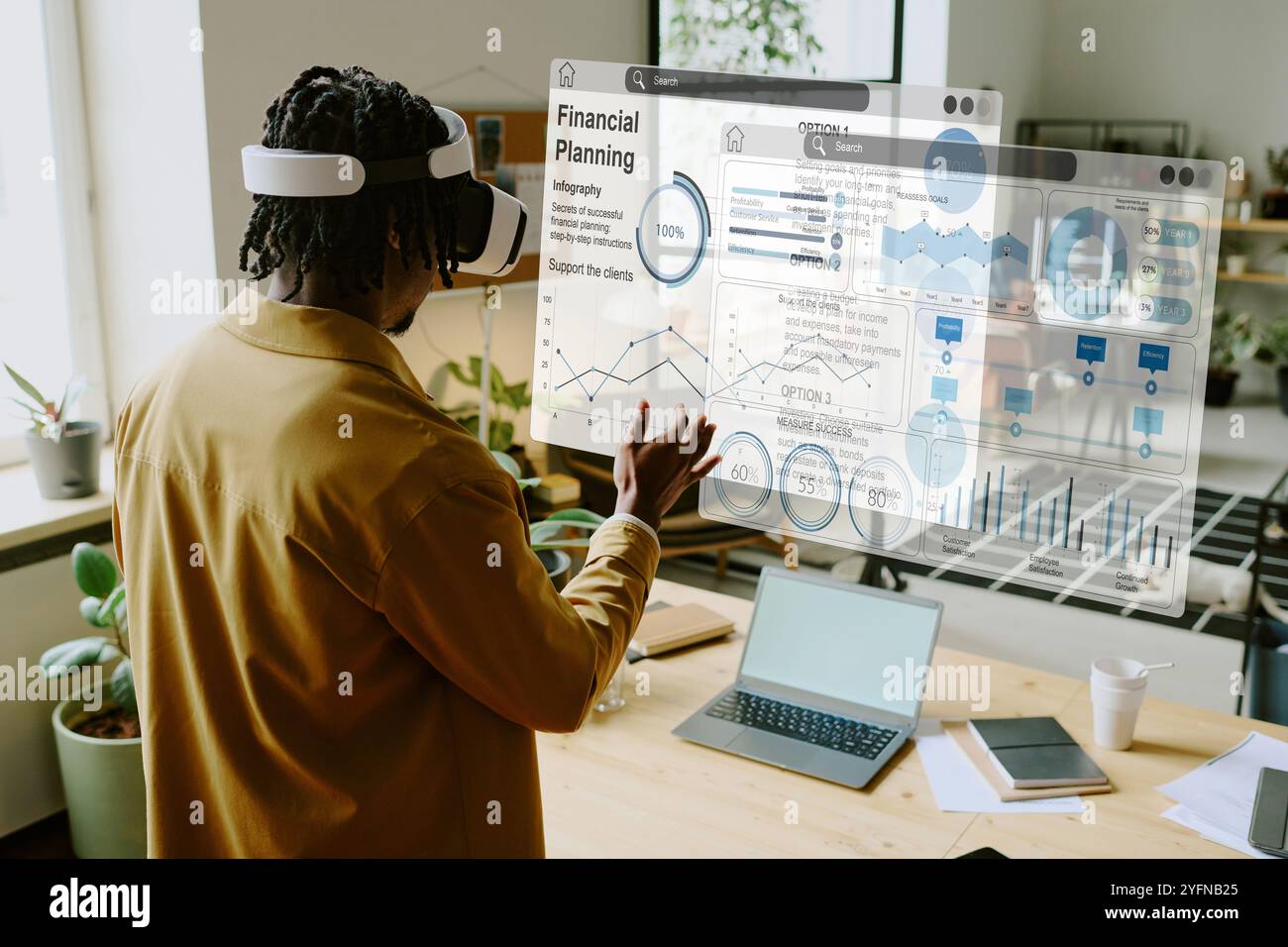 Black Man Testing VR App In Modern Office Stock Photo