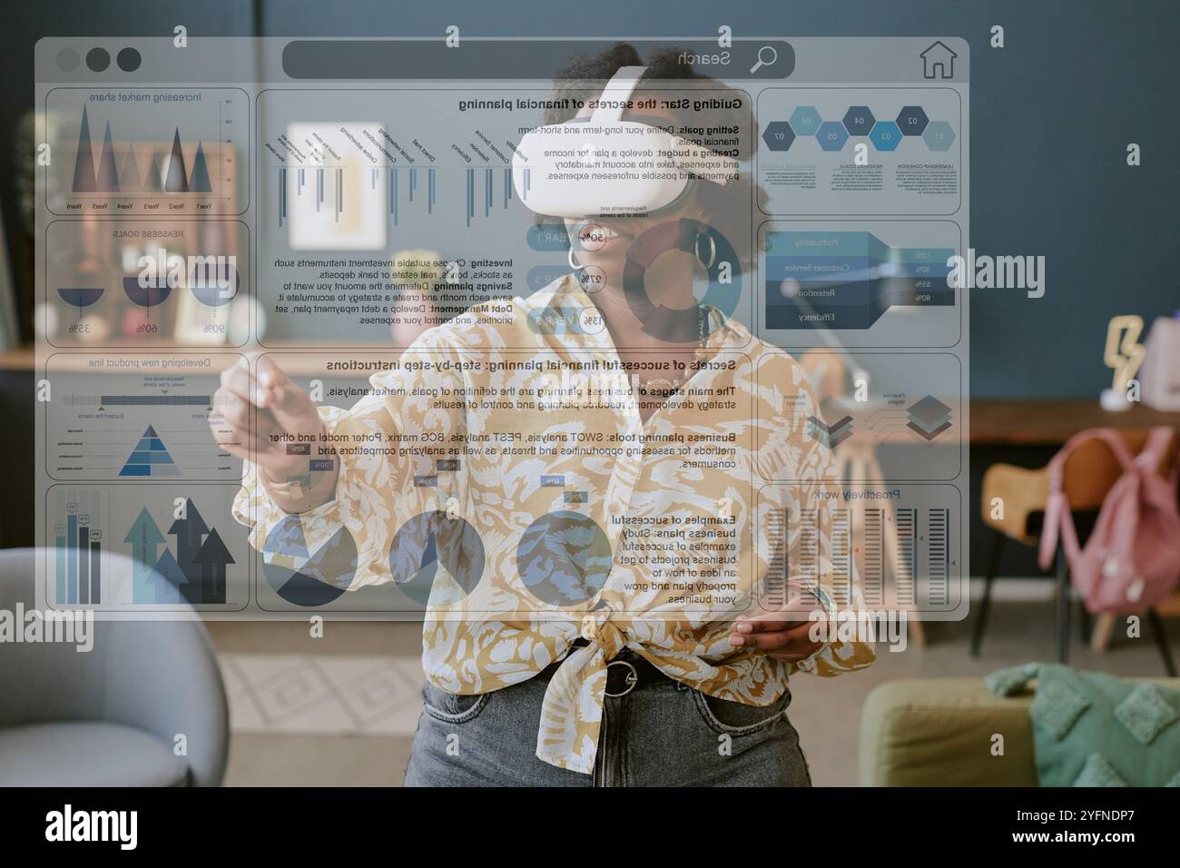 Using Virtual Reality Headset in Modern Living Room Stock Photo