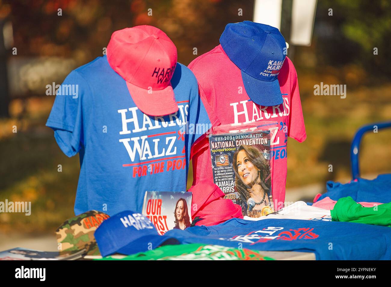 T-shirts and caps with Harris Waltz and a magazine with a portrait of Kamala Harris in Allentown, Pennsylvania, USA November 4, 2024 Stock Photo