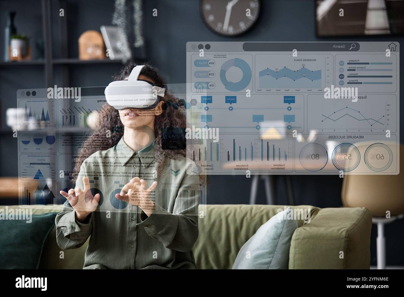 Woman In VR Headset Using App Stock Photo
