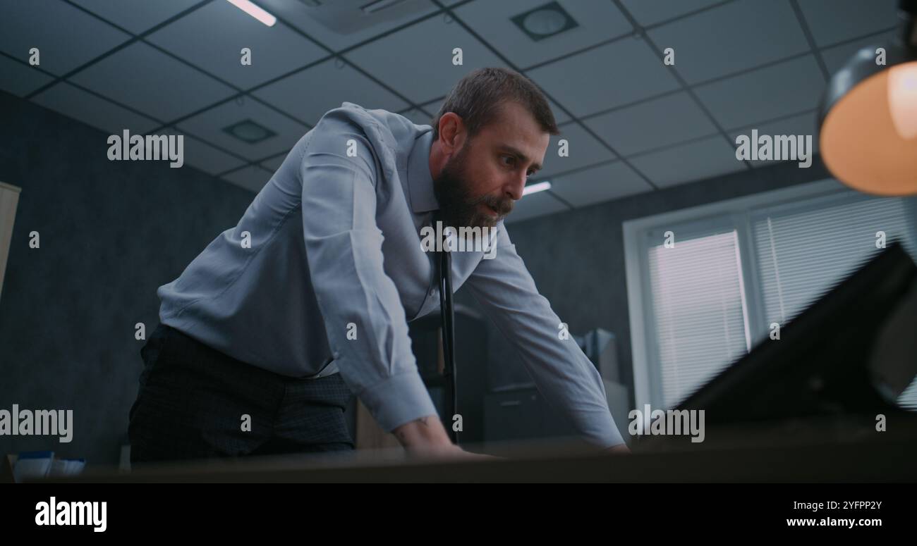 Angry businessman throwing keyboard hi-res stock photography and images ...