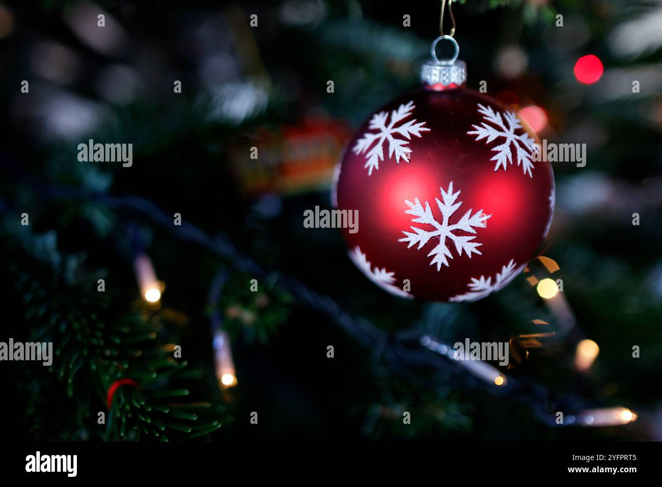 Christmas tree decorated with ornaments. Stock Photo