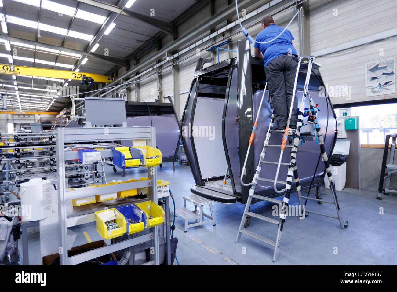 Industrial site. Worker in a factory. Manual work. Stock Photo