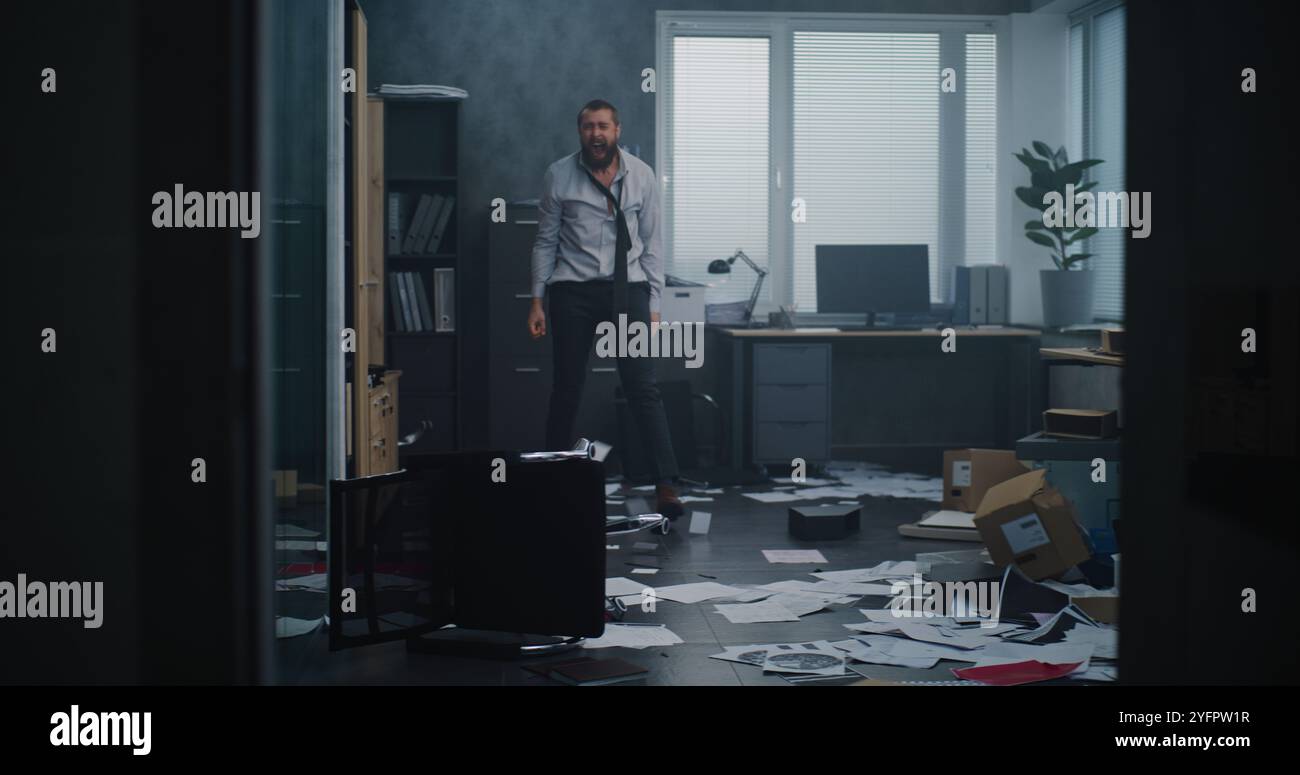 Losing Rage Full shot of aggressive businessman losing temper in fit of rage ...