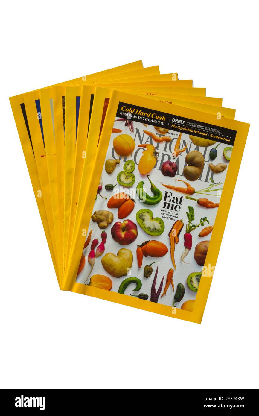 pile of National Geographic magazines isolated on white background Stock Photo