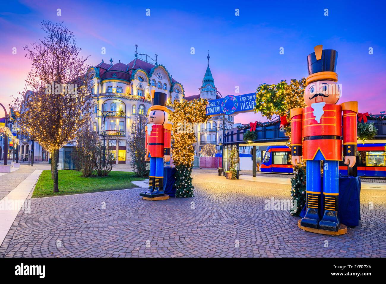 Oradea, Romania - 27th December 2023. Christmas Market with glowing lights, giant nutcracker decorations, joyful holiday season in Transylvania. Stock Photo
