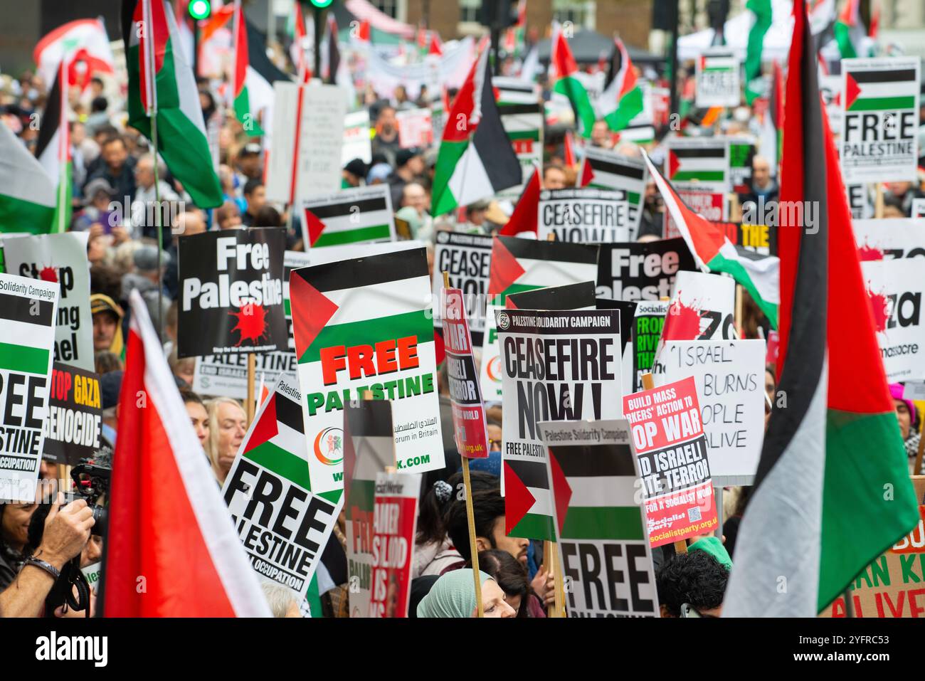 London, UK. 2nd November 2024. Protest signs used  by supporters at the National March for Palestine demonstration, London, demanding Justice for Palestine and for the government to help end the fighting. Stock Photo