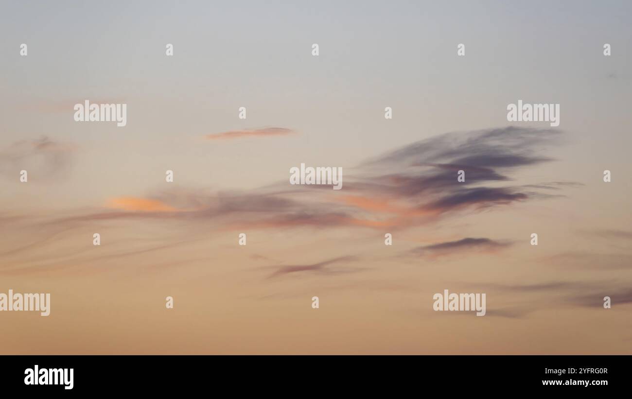 Light orange clouds at sunrise hi-res stock photography and images - Alamy