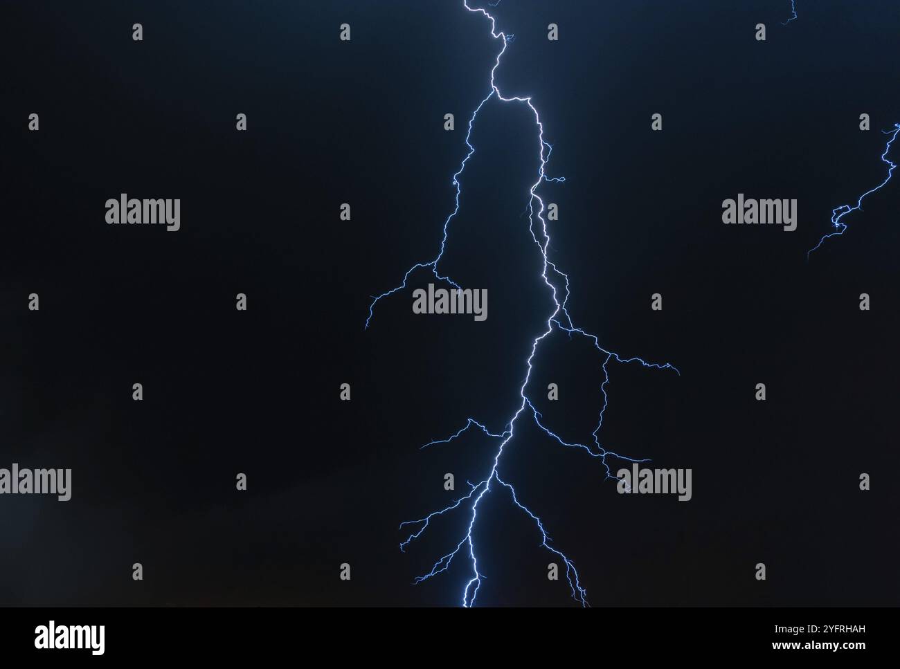 Electric blue lightning in stormy night sky. France Stock Photo - Alamy