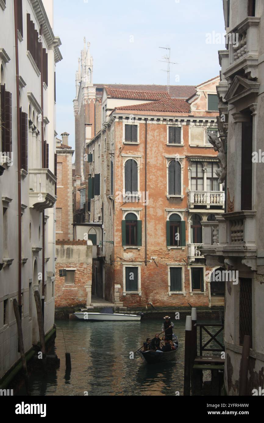Gondola in narrow venetian canal hi-res stock photography and images ...