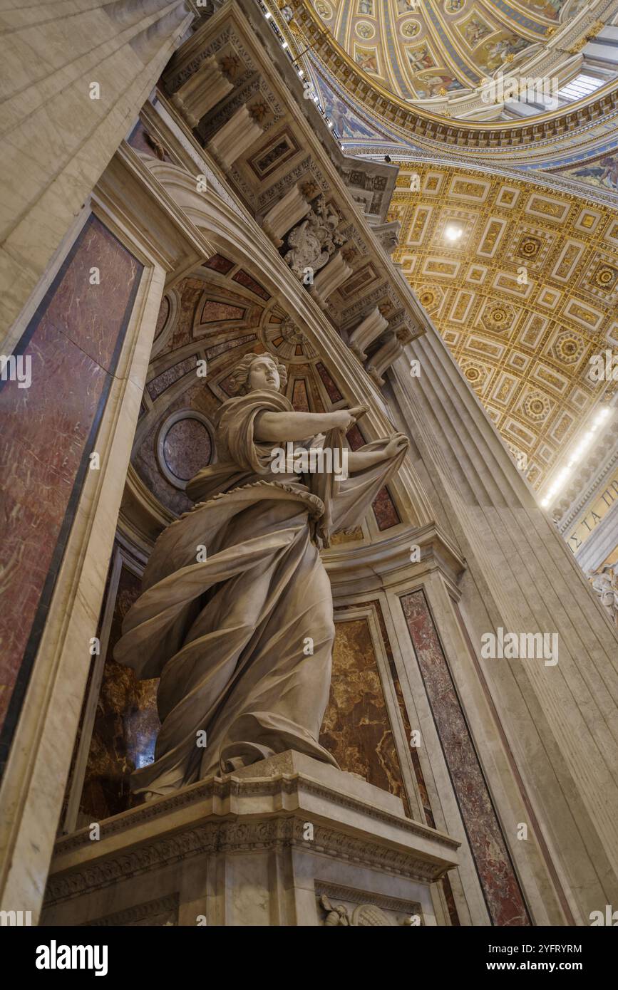 Marble statue in the central nave of St. Peter's Basilica, Rome ...