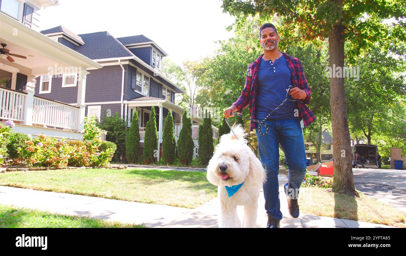 Low angle shot man walking hi-res stock photography and images - Alamy