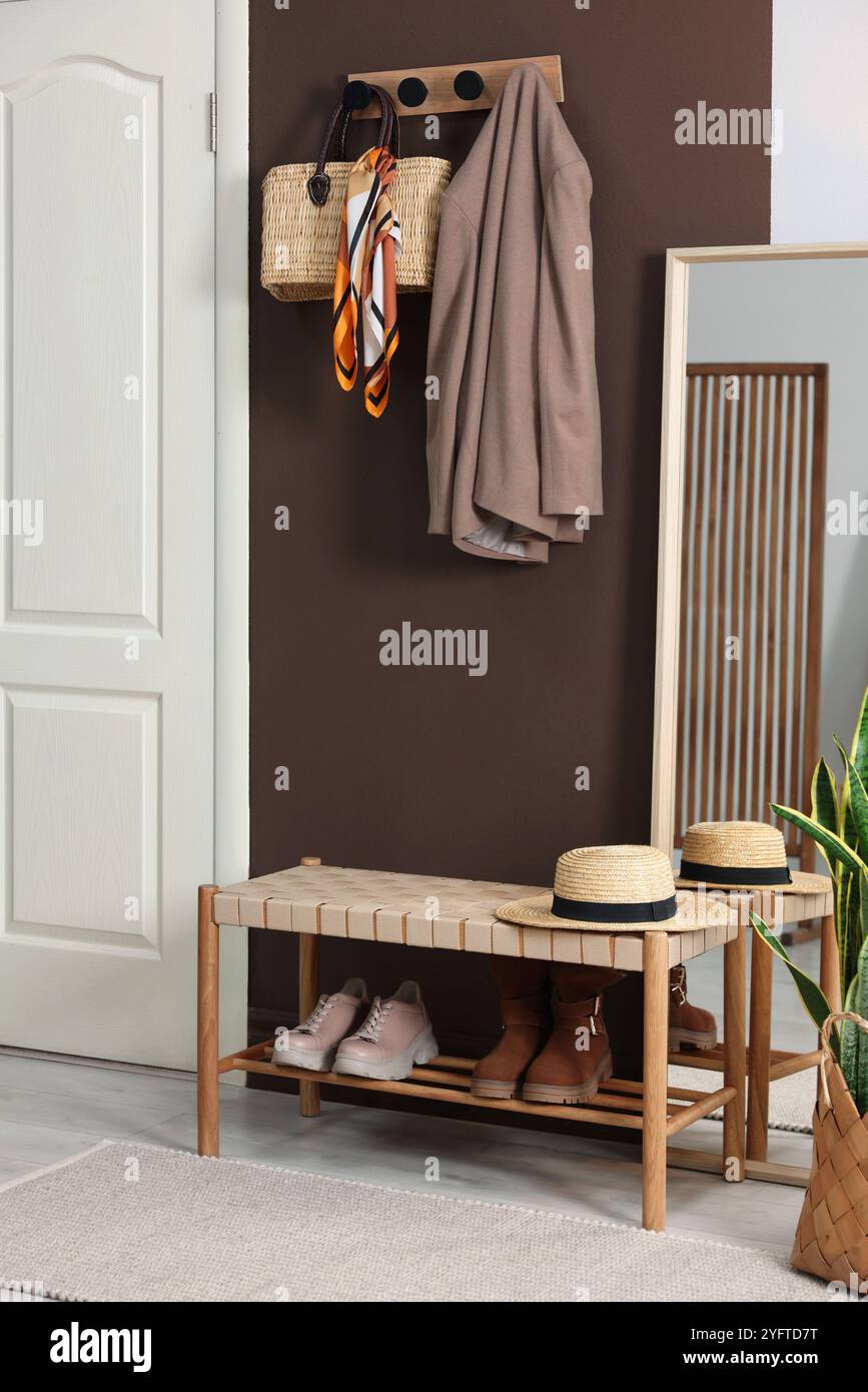 Hall Rack Interior Design Stylish hallway interior with coat rack and mirror Stock Photo - Alamy