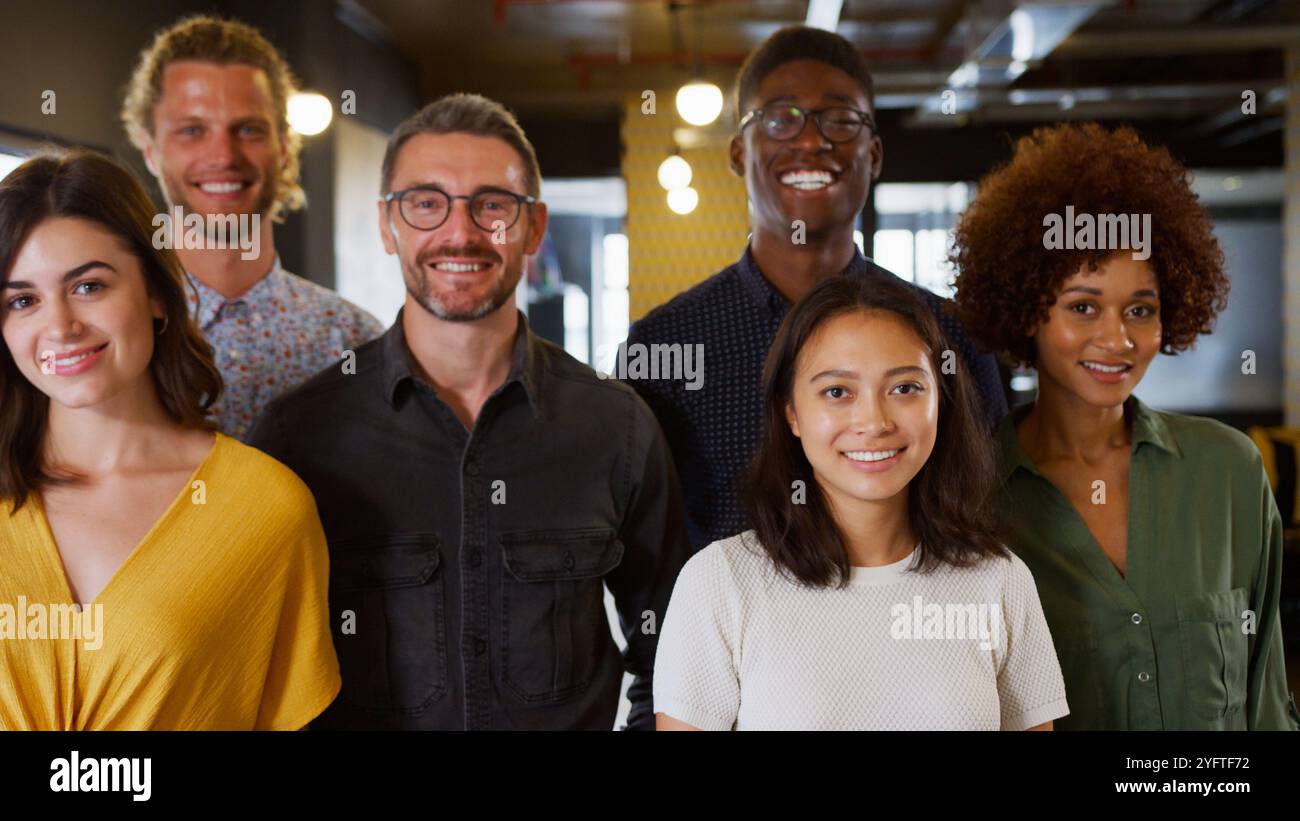 Smiling multi cultural business team hi-res stock photography and ...