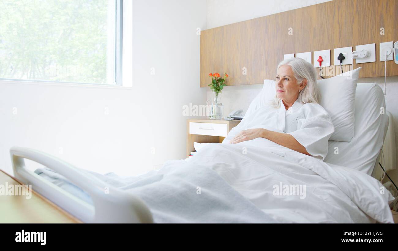 Female patient lying in hi-res stock photography and images - Alamy
