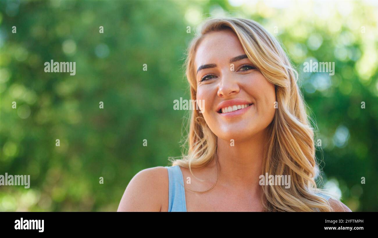 Long blonde hair smiles warmly hi-res stock photography and images - Alamy