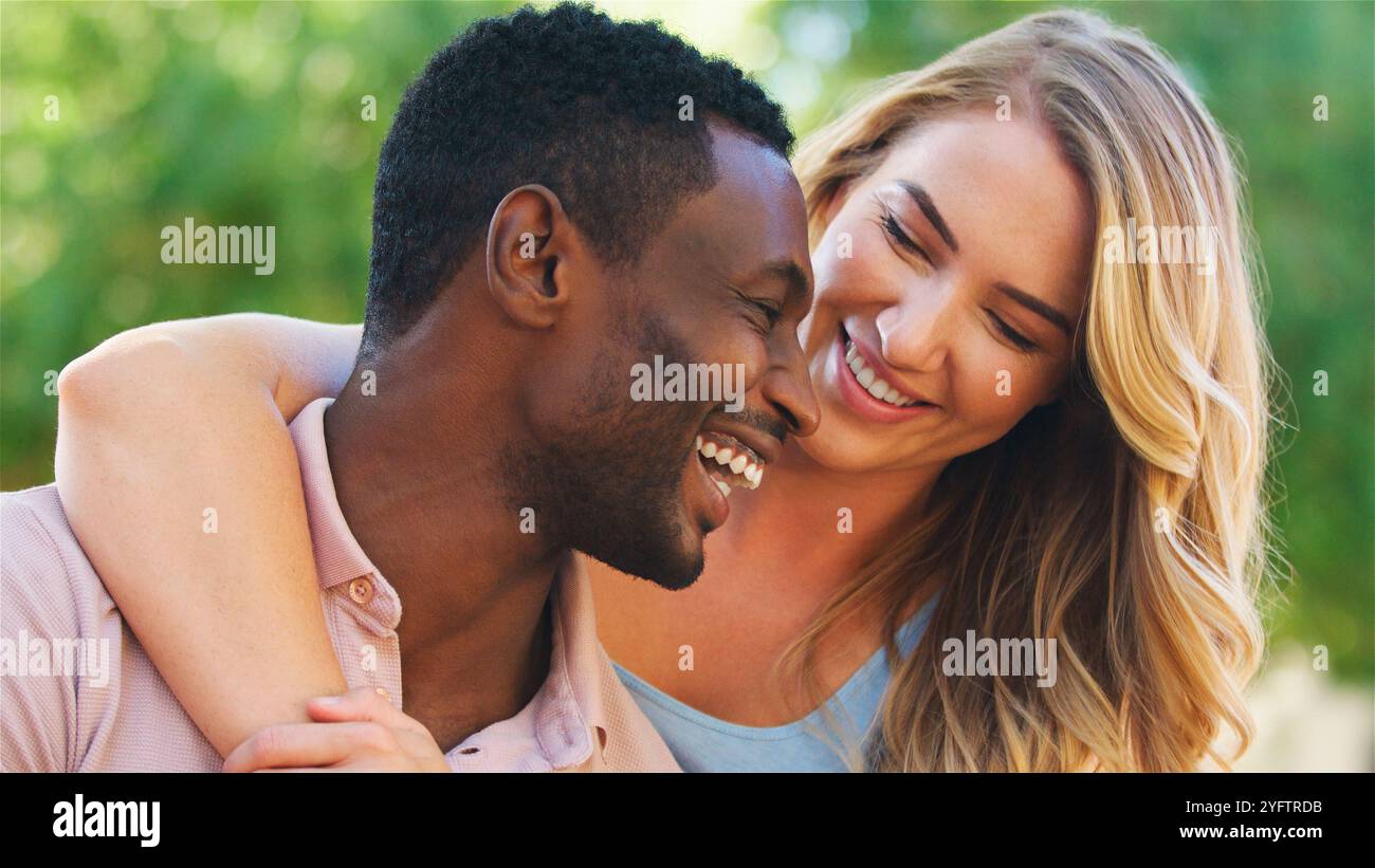Playful couple sharing joyful hi-res stock photography and images - Alamy